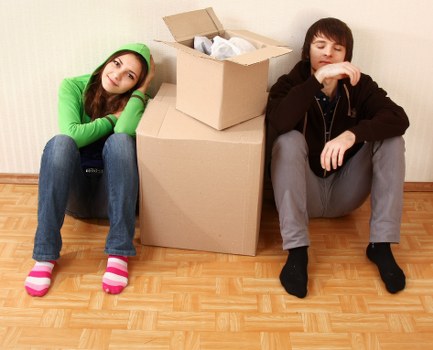 Office removals planning in Stepney with moving boxes and furniture