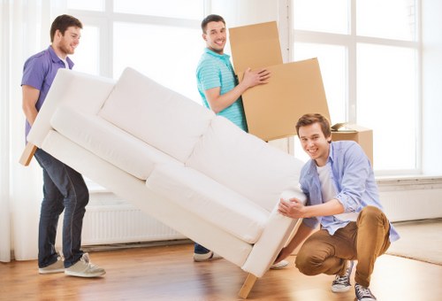 Packed boxes and furniture ready for house removals