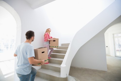 Careful transport of boxes and household items in East London