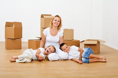 Prepared moving boxes and household items ready for removal in Stepney
