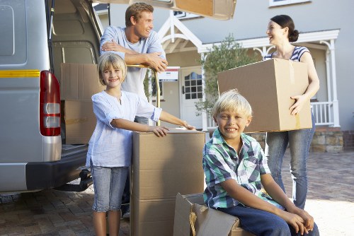 Professional movers loading household items for removals in Stepney